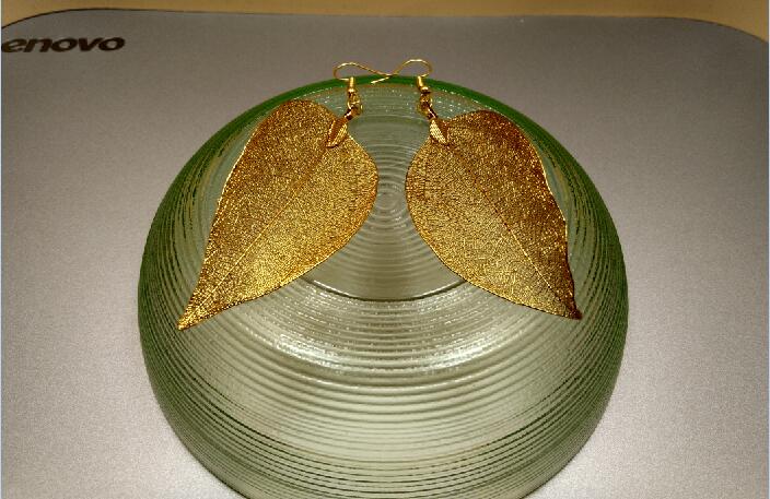 Long Gold Colored Leaf Earrings