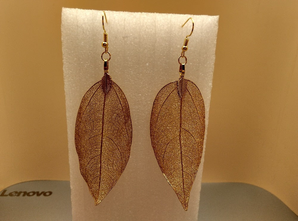 Long Gold Colored Leaf Earrings